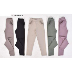 Spodnie dziewczęce materiałowe z falbankowym obszyciem- kolory do wyboru kieszeni